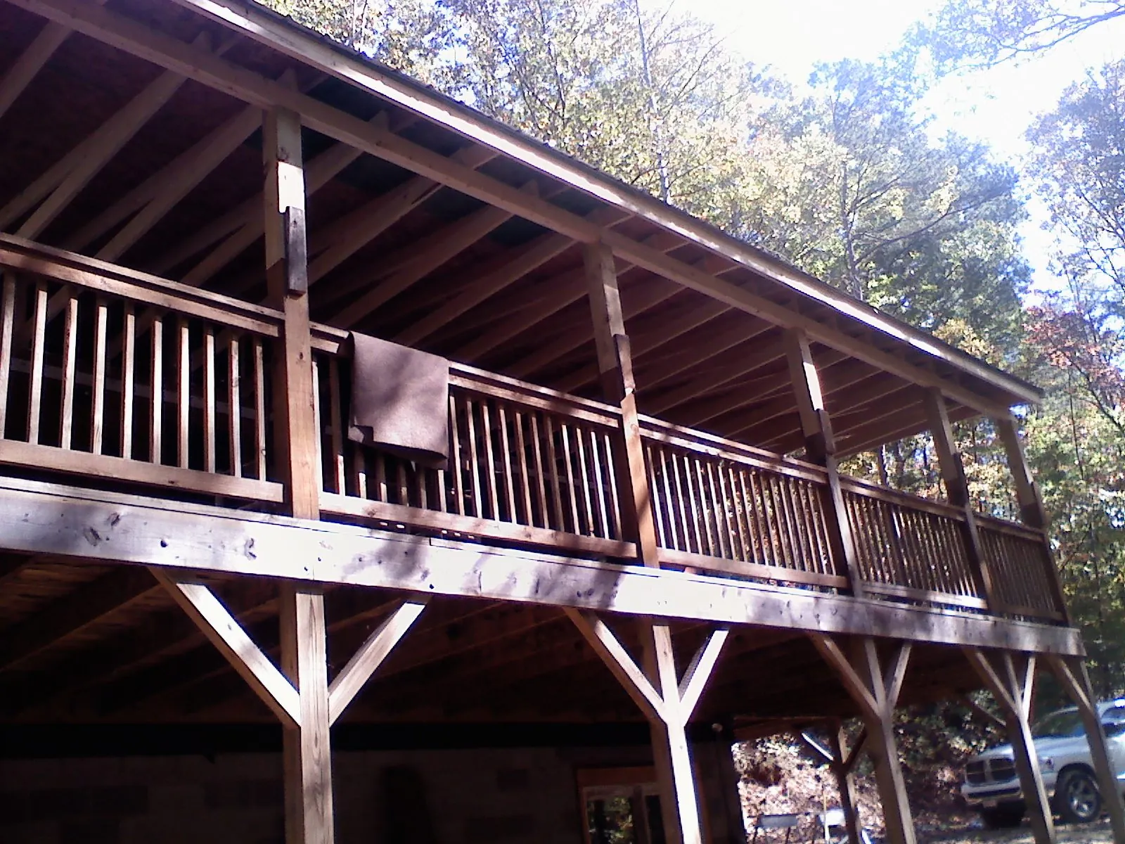 Timber framing under a new elevated porch and deck — Roof Leak Repair in Delano by Roofing Brothers